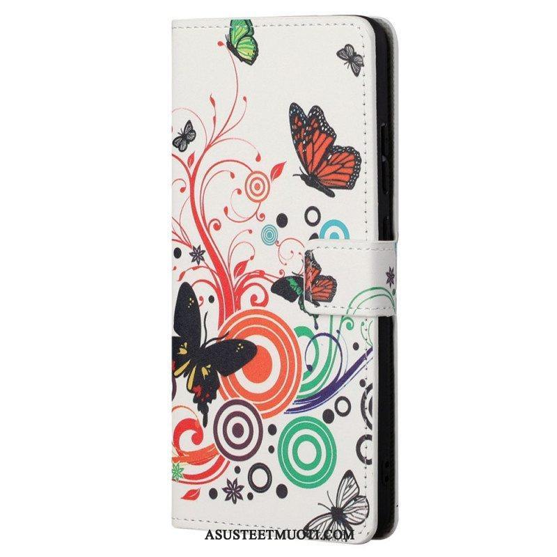 Nahkakotelo Xiaomi Redmi Note 11 / 11S Perhosia Ja Kukkia